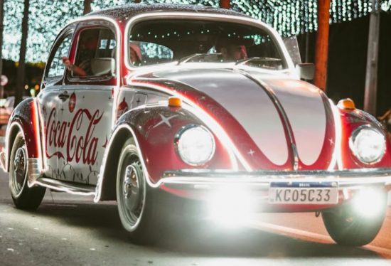 coca cola car advertisement with DeliveryDart logo