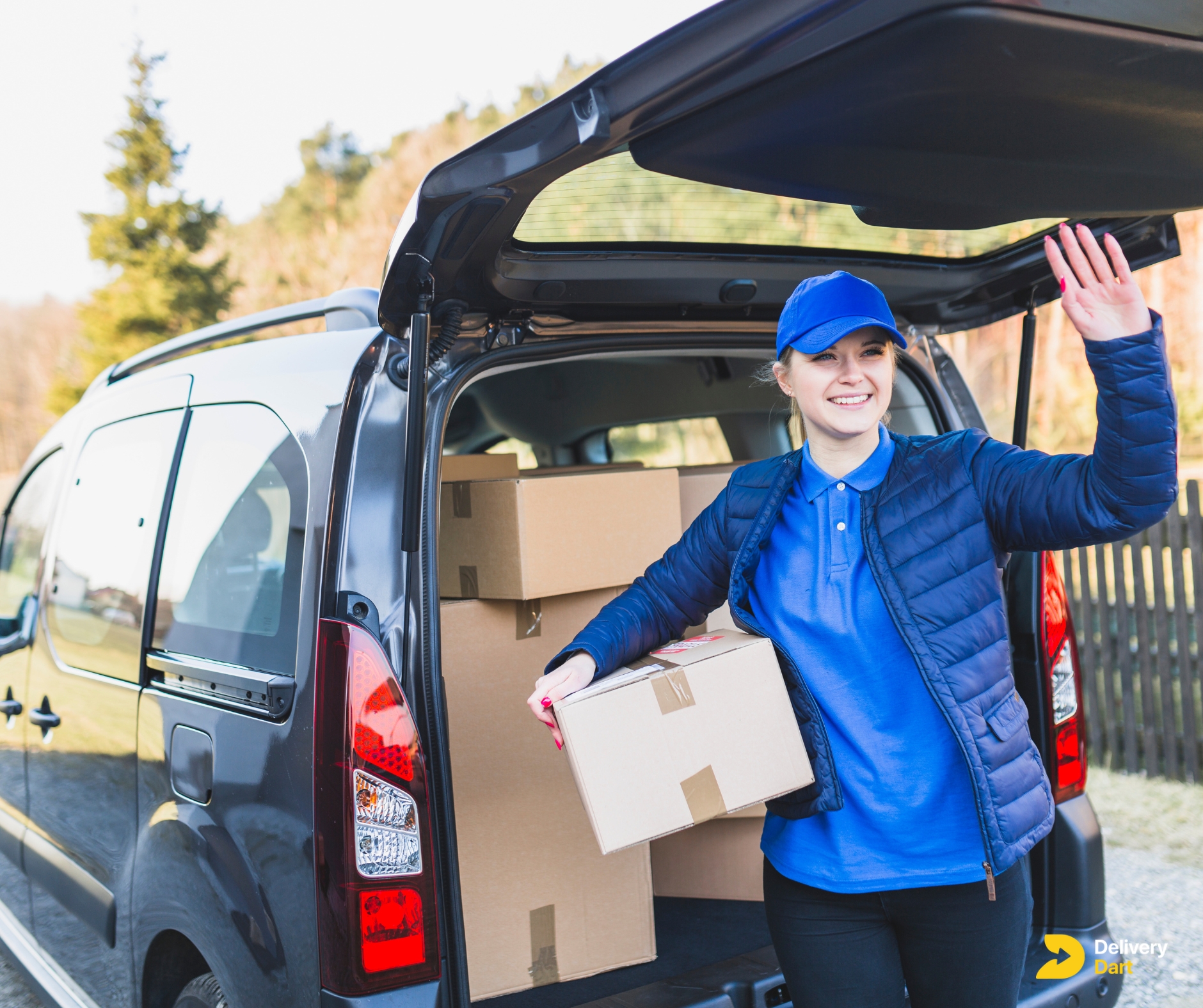 woman delivery driver with parcels in car along with DeliveryDart logo