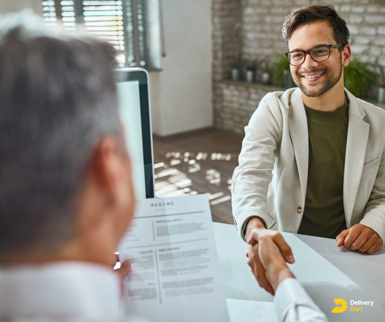 a person starting an interview along with the DeliveryDart logo