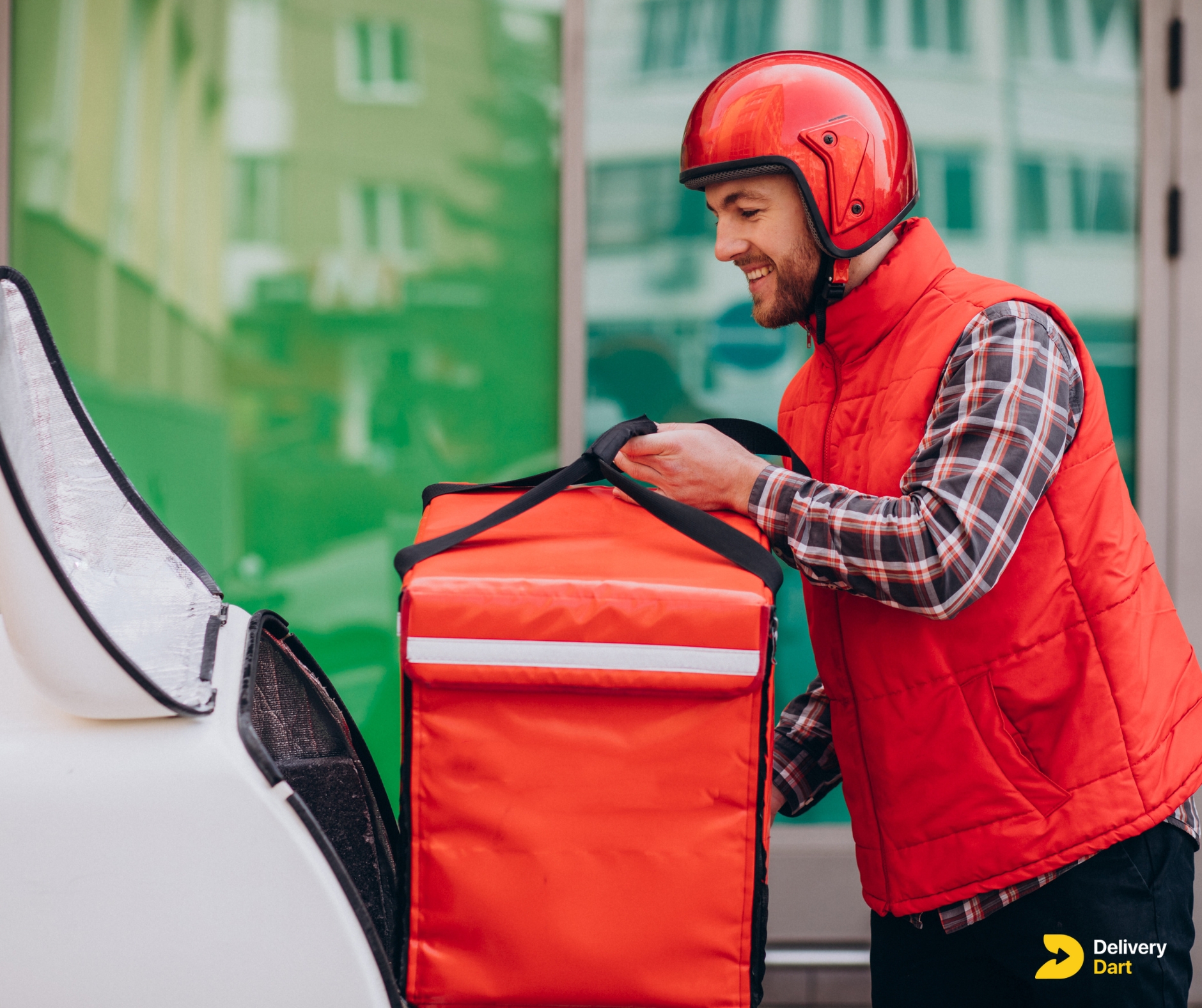 image of a delivery driver setting up his equipment with DeliveryDart logo