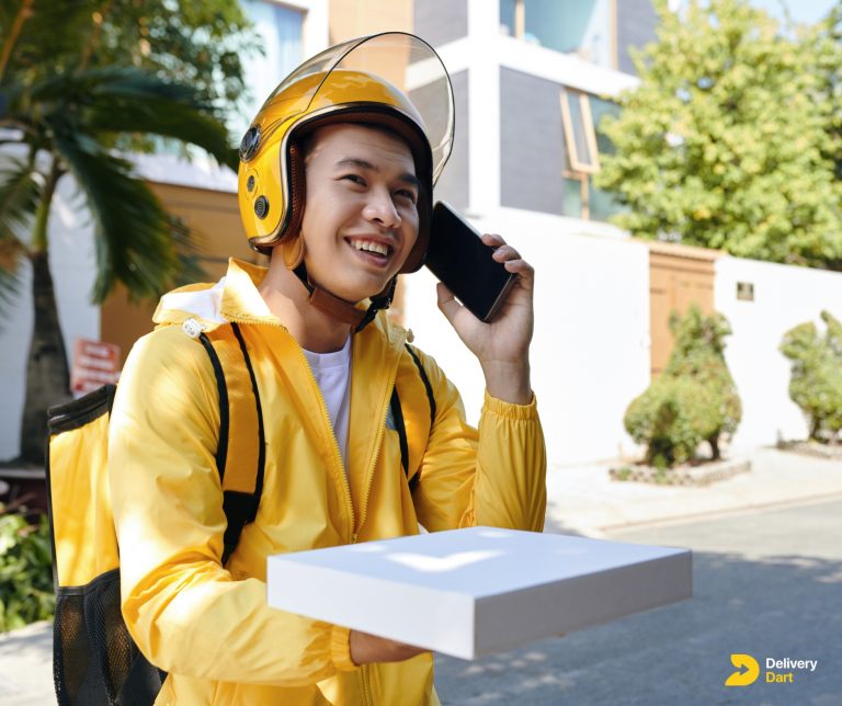 image of a delivery man calling a customer with DeliveryDart logo