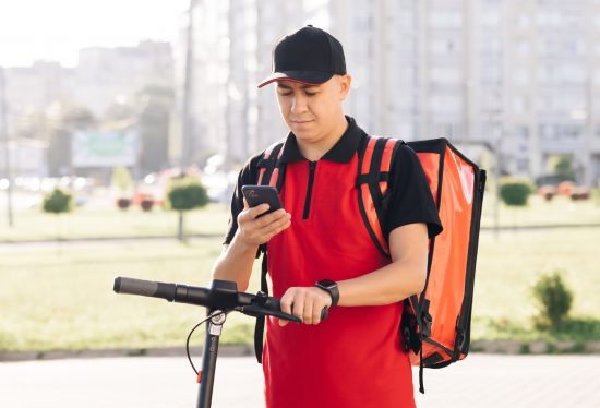 image of a fit delivery driver out on duty with a DeliveryDart logo