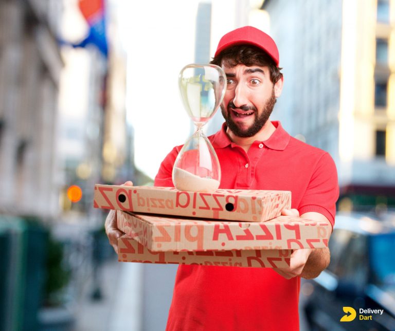 a man holding pizza boxes and an hour glass along with the DeliveryDart logo