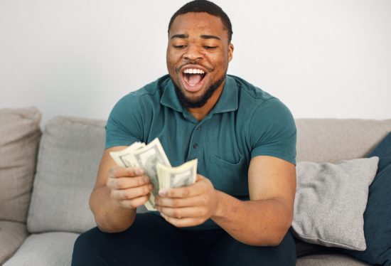 image of a delivery driver counting money with DeliveryDart logo