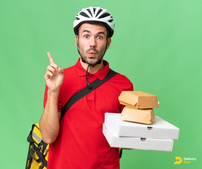 delivery driver holding items and pointing up with the DeliveryDart logo