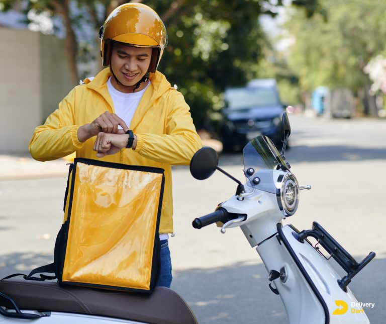 freelance delivery driver at work along with DeliveryDart logo