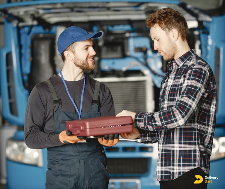 fleet maintenance workers along with deliverydart logo