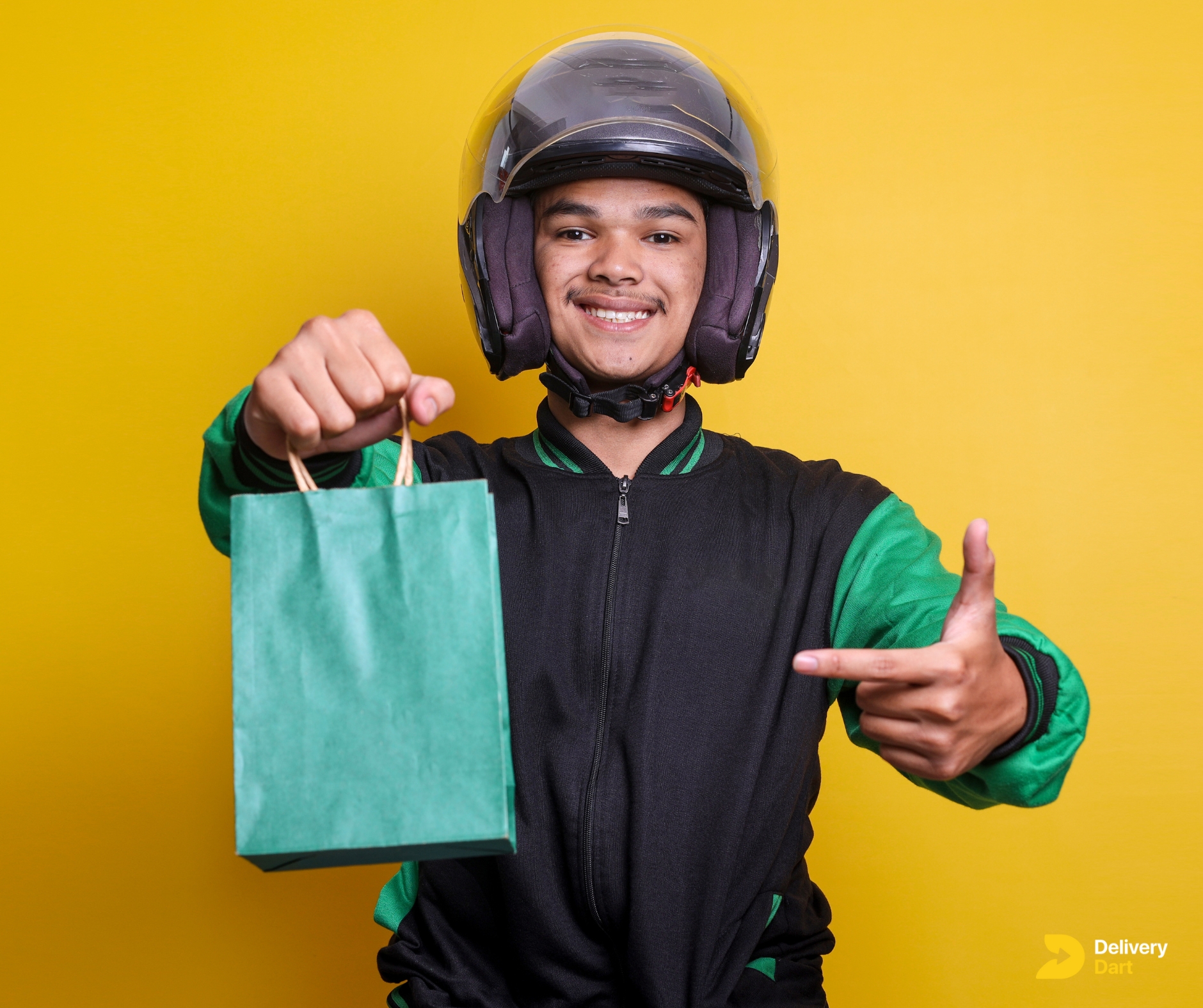 experienced delivery driver holding a bag along with DeliveryDart logo